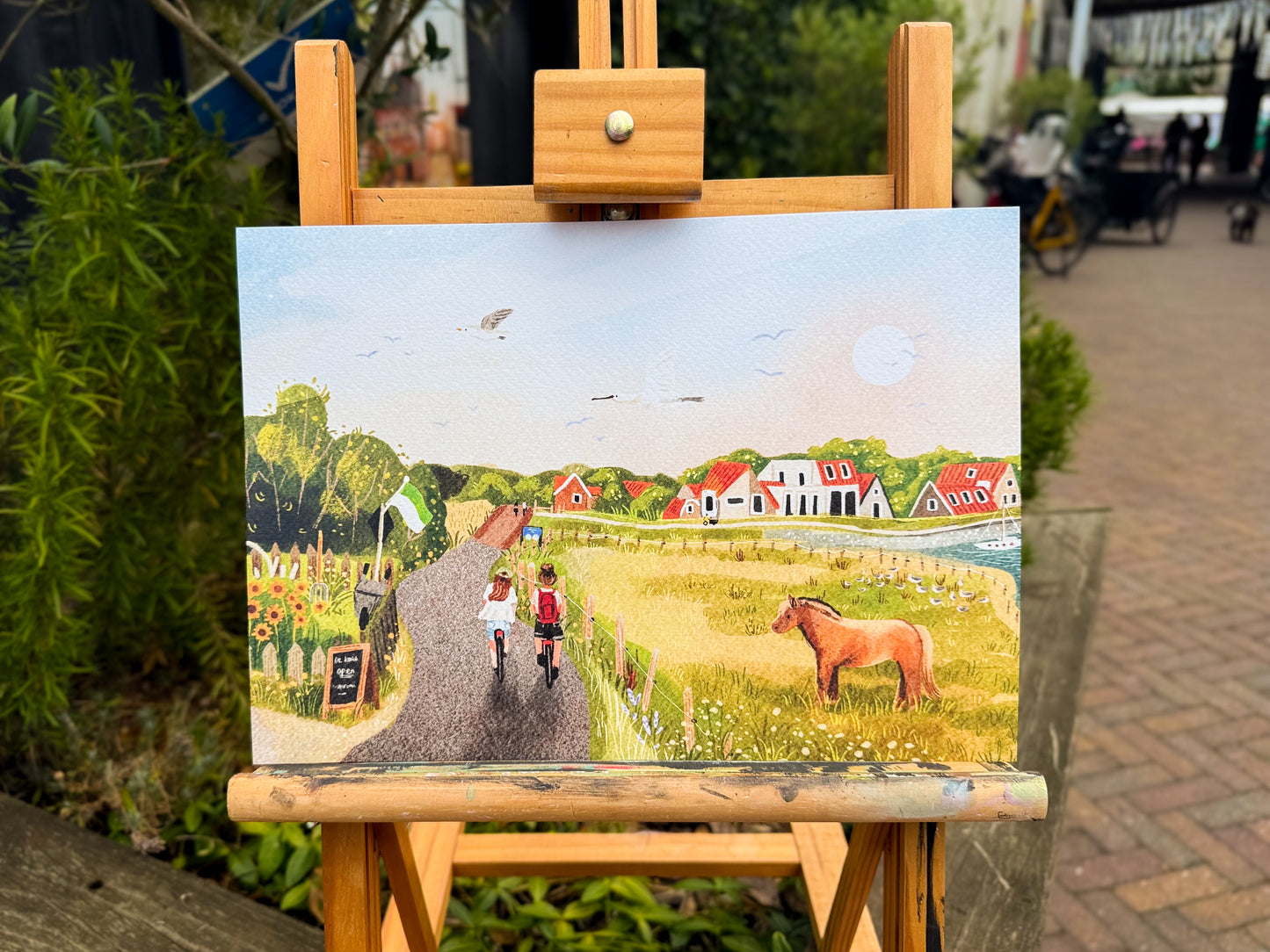 “Op de fiets naar het dorp” – A4 Art Print | Illustratie Poster op 300gsm Tintoretto Gesso